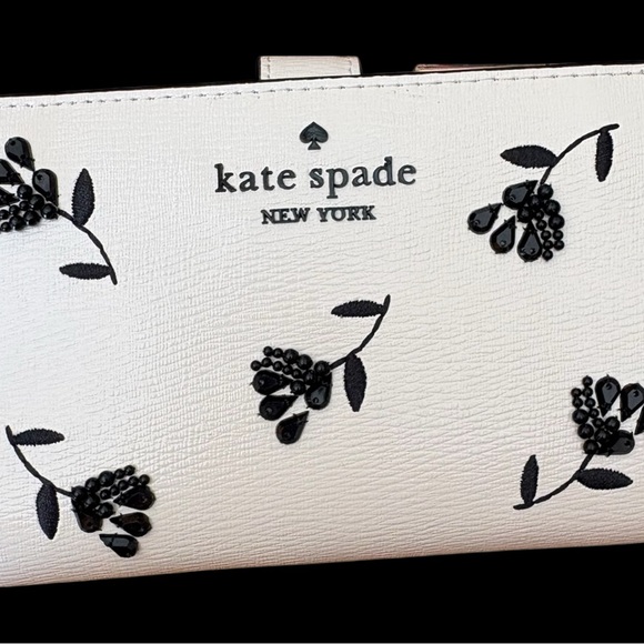 kate spade Handbags - NWT Kate Spade Cream and Black Embellished Wallet